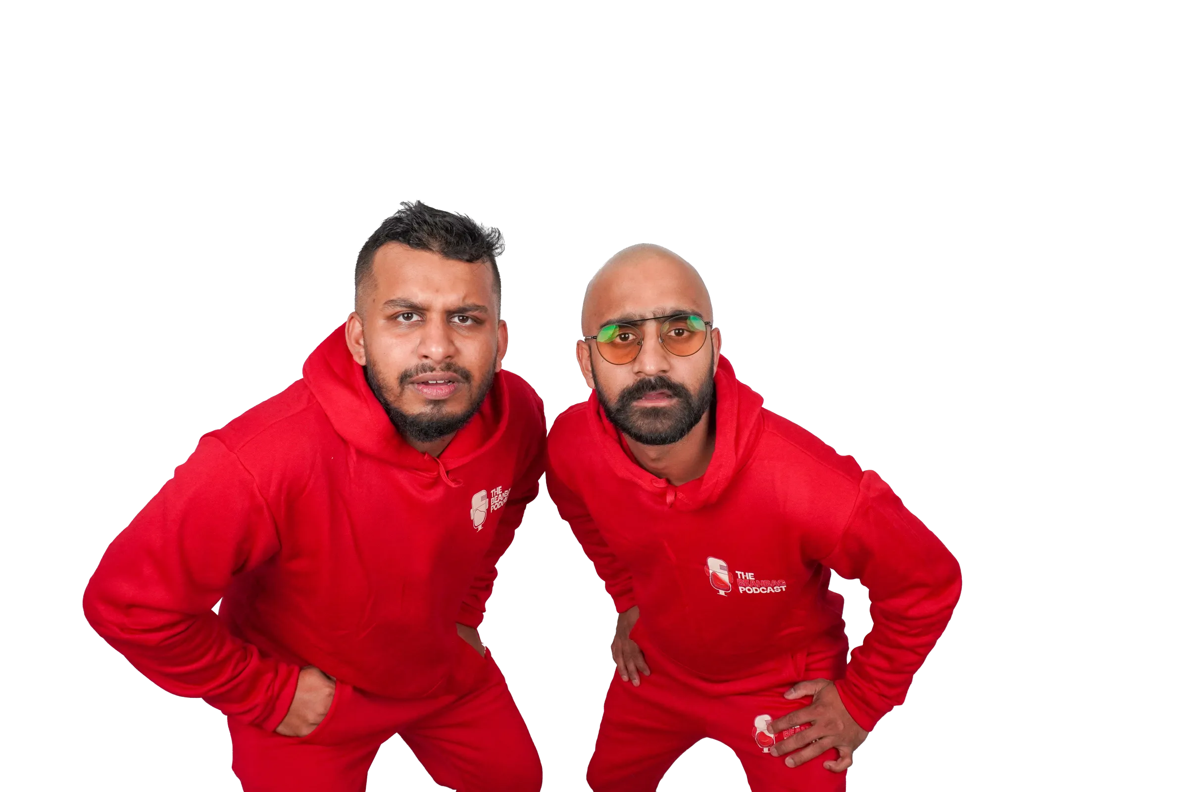 The two hosts of The BeanBag Podcast leaning in, dressed in brand red.